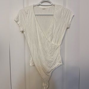 Selling v-neck white bodysuit